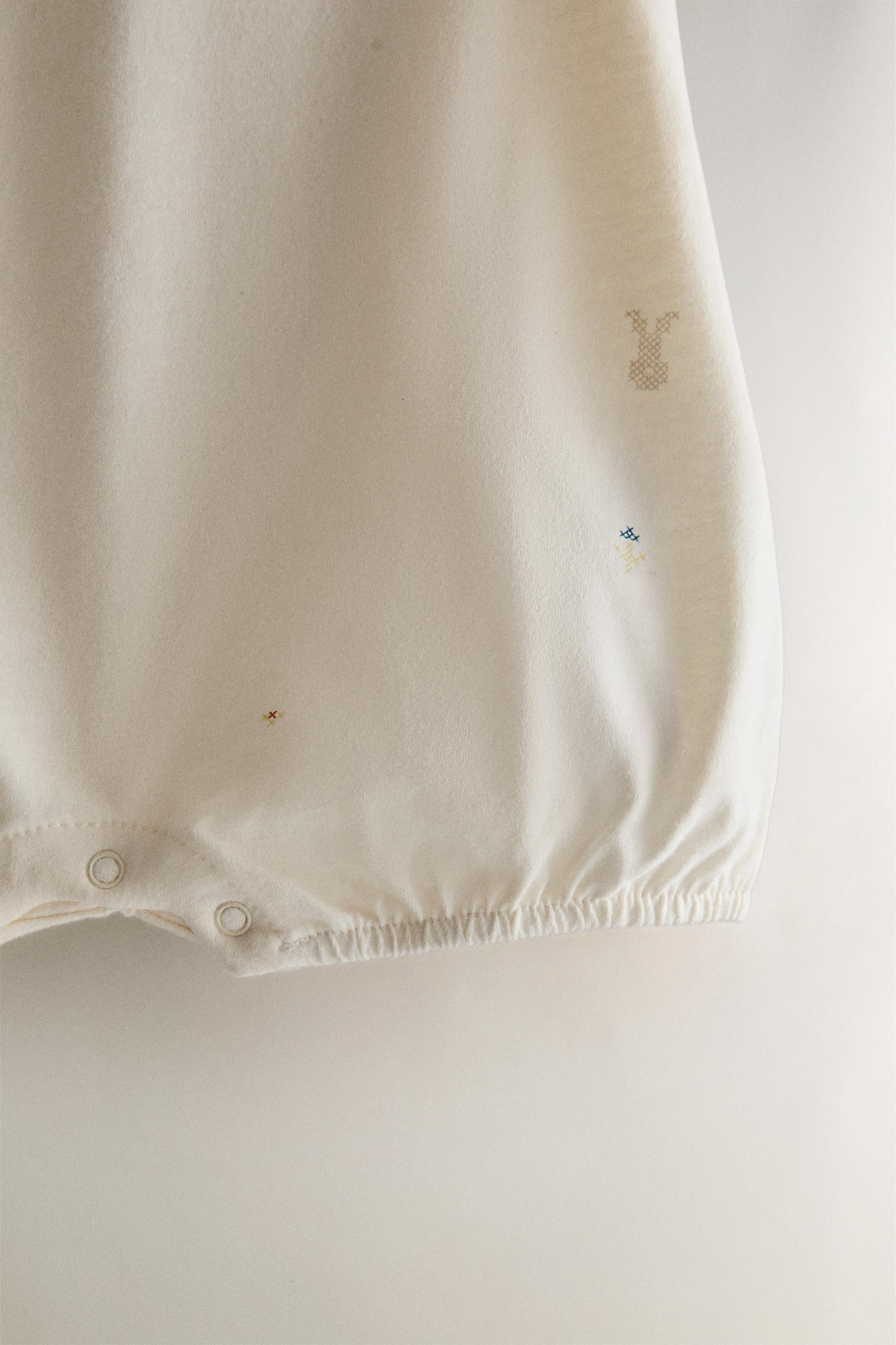KIDS RABBIT & FLOWER FOOTED ROMPER